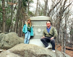 My daughter and me years ago on Little Round Top, checking out the memorial to the 20th Maine. 
